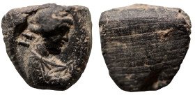 ancient token. femine head right. (13mm, 0,86g)