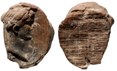 ancient token.laureate bust right. Claudius(?). (27mm, 3,67g)