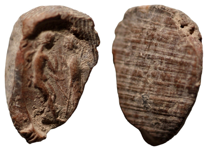 ancient token. two figures facing. (17mm, 1,80g)