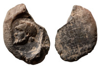 ancient token. male head left. (13mm, 0,52g)