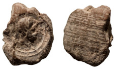 ancient token. head of Zeus (?) right. (13mm, 0,84g)