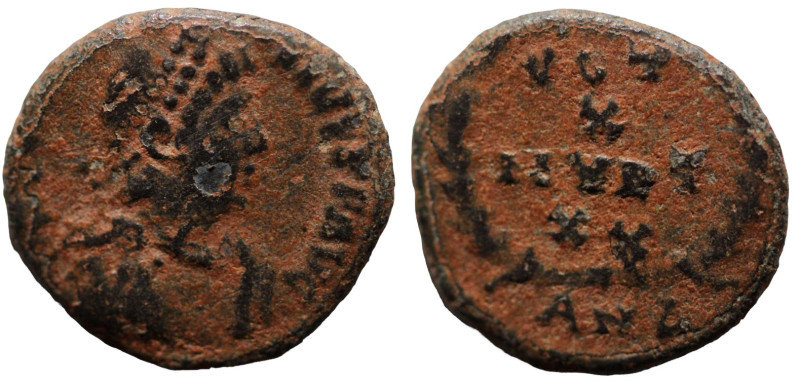 Valentinian II. (380 AD). Æ Follis. (12mm, 1,32g) Antioch. Obv: D N VALENTINIANV...