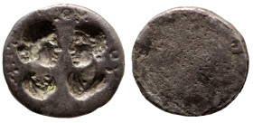 ancient seal. undefined metal. two busts facing. (13mm, 2,58g)