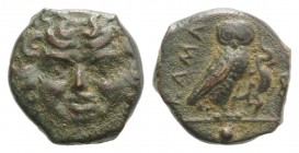 Sicily, Kamarina, c. 420-405 BC. Æ Onkia (11mm, 1.59g, 9h). Facing gorgoneion. R/ Owl standing r., head facing, grasping lizard in talons. CNS III, 4;...