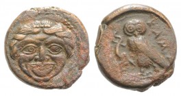 Sicily, Kamarina, c. 420-405 BC. Æ Tetras (13mm, 2.62g, 2h). Facing gorgoneion. R/ Owl standing l., head facing, grasping lizard. CNS III, 10; HGC 2, ...