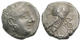 Attica, Athens, c. 327-294 BC. AR Tetradrachm (22mm, 16.97g, 9h). Head of Athena r., wearing crested Attic helmet. R/ Owl standing r.; olive sprig and...