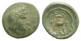 Bithynia, Kios, c. 3rd century BC. Æ (11.5mm, 1.47g, 12h). Head of Mithras r., wearing a laureate tiara. R/ Kantharos with two grape vines within wrea...