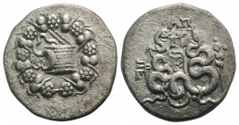 Mysia, Pergamon, c. 166-67 BC. AR Cistophoric Tetradrachm (27mm, 11.94g, 12h), c. 76 BC. Cista mystica with serpent; all within ivy-wreath. R/ Two ser...