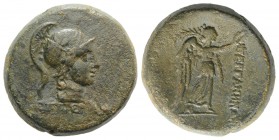 Mysia, Pergamon, c. 133-27 BC. Æ (22mm, 12.39g, 12h). Pergamos, magistrate. Helmeted head of Athena r. R/ Nike standing r., holding wreath and palm. S...