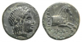 Ionia, Kolophon, c. 360-330 BC. Æ (13mm, 2.16g, 12h). Dionysiphanes, magistrate. Laureate head of Apollo r. R/ Forepart of bridled horse r. Kinns 60; ...