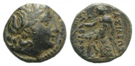 Seleukid Kings, Seleukos III (225/4-222 BC). Æ (13mm, 2.03g, 1h). Laureate head of Apollo r. R/ Apollo Delphios seated l.; monogram to outer l. SC 924...