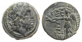 Seleukid Kings, Demetrios II (Second reign, 129-125 BC). Æ (15mm, 5.72g, 12h). Antioch on the Orontes, 129-8 BC. Laureate head of Zeus r. R/ Nike adva...