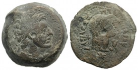 Ptolemaic Kings of Egypt, Ptolemy IV (222-205/4 BC). Æ Diobol (28mm, 20.16g, 11h). Kyrene. Diademed head of Ptolemy I r., wearing aegis. R/ Head of Li...