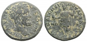 Septimius Severus (193-211). Lydia, Saitta. Æ (24mm, 8.31g, 6h). Andronicus, archon. Laureate head r. R/ Mên standing l., holding pine cone and sceptr...
