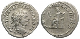 Caracalla (198-217). AR Denarius (19mm, 2.98g, 12h). Rome, AD 214. Laureate head r. R/ Apollo seated l., holding branch and leaning against tripod wit...