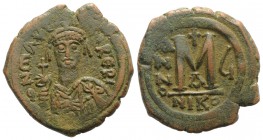Maurice Tiberius (582-602). Æ 40 Nummi (30mm, 12.87g, 7h). Nicomedia, year 6 (587/8). Helmeted and cuirassed bust facing, holding globus cruciger and ...