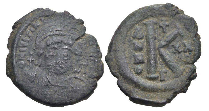 Byzantine
Justinian I (527-565 AD). Constantinople
AE Half Follis (24.68mm 6.5...