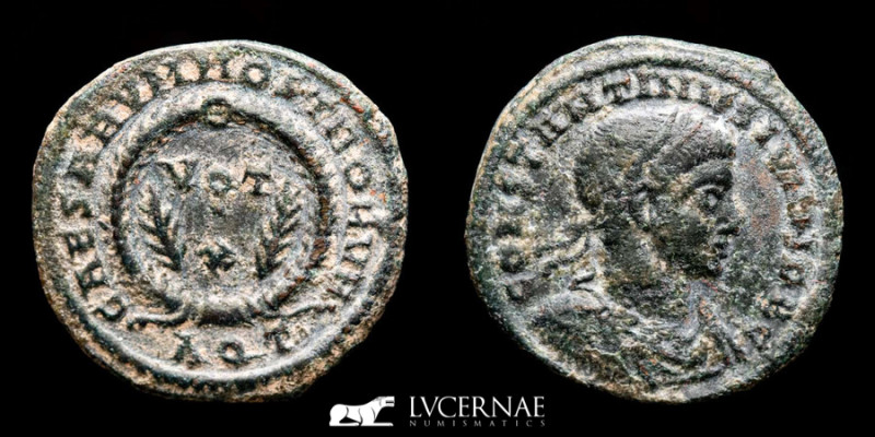 Constantine II as caesar bronze follis. Aquileia. CAESARVM NOSTRORVM /VOT X Palm...