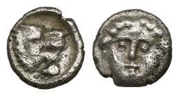 Greek Coins 
PAMPHYLIA. Aspendos. Obol (Circa 460-360 BC).
Obv: Facing gorgoneion, tongue protruding.
Rev: Head of lion right; all within pelleted lin...
