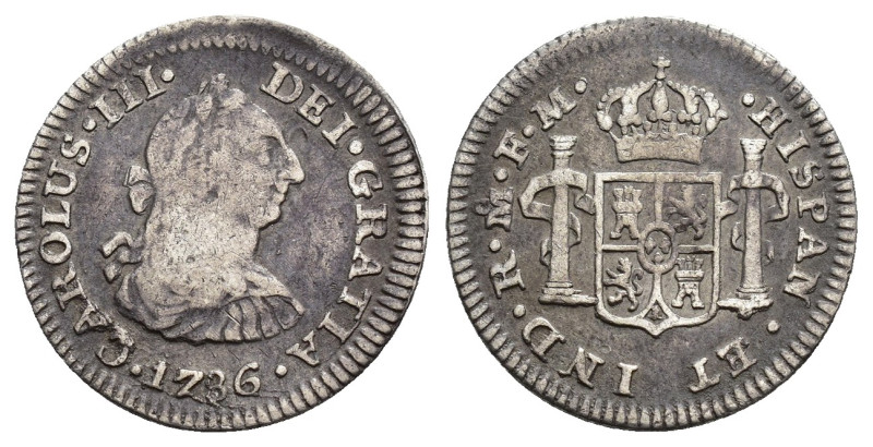 CARLOS III. 1/2 real. México. 1786. FM. AR 1,62 g. 17,3 mm. VI-188. Golpecito en...