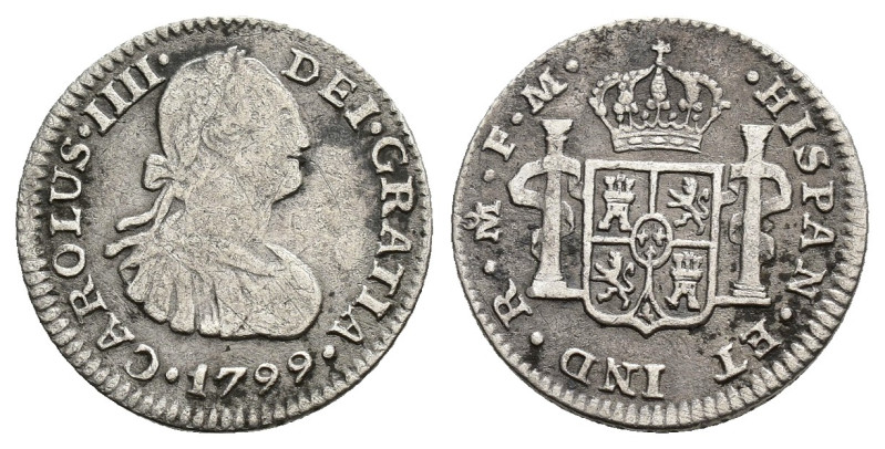 CARLOS IV. 1/2 real. México. 1799. FM. AR 1,57 g. 16,3 mm. VI-241. Pequeñas marc...