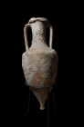 ARQUEOLOGÍA. ROMA. Ánfora de grano (ss. III-I a.C.). Cerámica. Altura 74 cm. Adjunta certificado de termoluminiscencia QED Laboratoire. Restaurada. Pr...