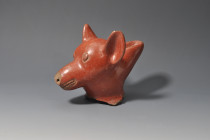 ARQUEOLOGÍA. PREHISPÁNICO. Cultura Colima. Fragmento en forma de cabeza de perro (200 a.C.-500 d.C.). Cerámica. Altura 16 cm. Fragmentado, restaurado ...