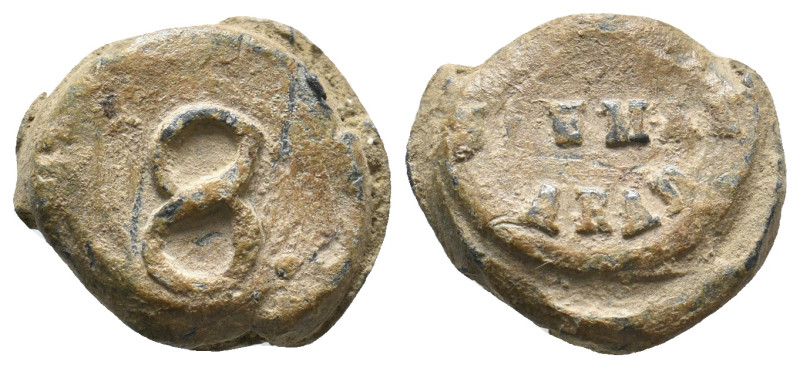 BYZANTINE LEAD SEAL. Uncertain.
7.56 Gr. 17.6 mm.