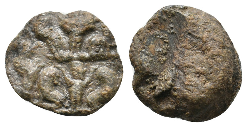 UNCERTAIN. LEAD SEAL.
3.82 Gr. 16 mm.