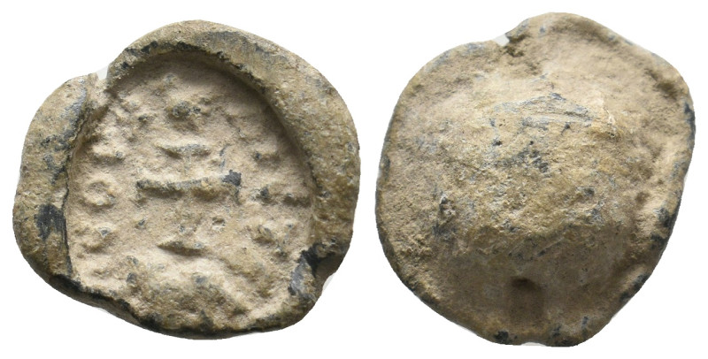 BYZANTINE LEAD SEAL.
5.11 Gr. 18 mm.