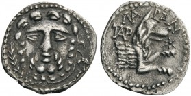 GREEK COINS 
 LYCAONIA 
 Laranda. Circa 324/3 BC (?). Obol (Silver, 12mm, 0.58 g 5). Head of bearded Herakles facing with olive branch to left. Rev....