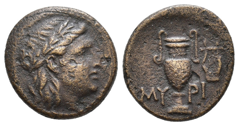 Aeolis, Myrina. AE 200-100 BC. Laureate head of Apollo to right. Rev. MY-PI acro...