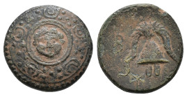 Kings of Macedon, Philip III Arrhidaios. 323-317 BC. AE Miletos mint, Macedonian shield, with Gorgoneion in central boss. Rev. helmet, bipennis to lef...