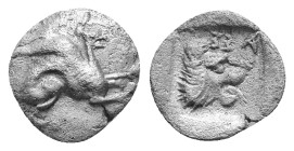Troas, Assos. AR Obol, 5th century BC. Griffin seated right. / AΣΣ, Head of roaring lion right within incuse square. AR 0,57g.
