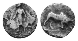 Cilicia. Uncertain mint ? Circa 400-300 BC. Obol AR Male ? figure standing left. Bull butting right. Possible first known examble ? AR 0,36g.