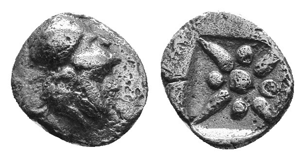 Asia Minor, Uncertain. 5th century BC. AR Hemiobol Helmeted head / Stellate patt...