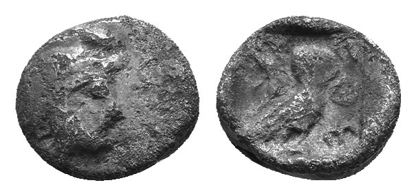 Attica, Athens. AR Obol. Circa 454-404 BC. Helmeted head of Athena right / Owl s...