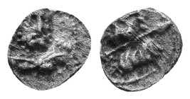 Cilicia, Uncertain. 4th century BC. AR Tetartemorion, Laureate and bearded head of Herakles facing slightly right, with lion’s skin tied around neck a...