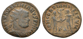 Maximianus. 292-295 AD. AE Antoninianus. Heraclea. Radiate and draped bust right. / Jupiter presents Victory on a globe to Maximianus, KΔ. AE 2,60g.