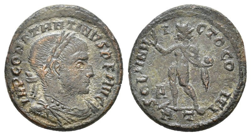 Constantine I. AE Nummus. Rome, 317 AD. IMP CONSTANTINVS P F AVG, laureate, drap...