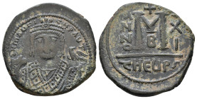 Maurice Tiberius, 582-602 AD. AE Follis. Theoupolis (Antioch.) Obv: D N MAVΓI- CNPAV[..] Frontal bust of Maurice wearing loros and crown with cross. A...