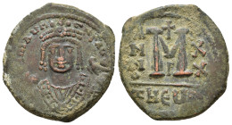 Maurice Tiberius, 582-602 AD. AE Follis. Theoupolis (Antioch.) Obv: Frontal bust of Maurice wearing loros and crown with cross. Akakia in right hand, ...