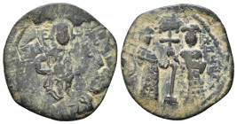 Constantine X. 1059-1067 AD. AE Follis. Christ standing facing on footstool, holding book of Gospels. / Eudocia on left and Constantine on right stand...