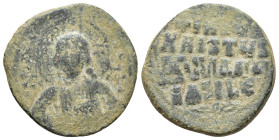 Attributed to Basil II and Constantine VIII. 976-1028 AD. Anonymous Follis Constantinople. AE Bust of Christ, facing, with nimbate cross. / four lines...