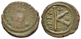 Maurice Tiberius. 582-602 AD. AE 20 Nummi. Constantinople, Year 10. 591/2 AD. Diademed, helmeted and cuirassed facing bust, holding globus cruciger. /...
