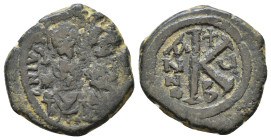 Justin II. 565-578 AD. AE Half Follis. Constantinopolis. Justin, holding cross on globe, and Sophia, holding cruciform sceptre, seated facing on doubl...