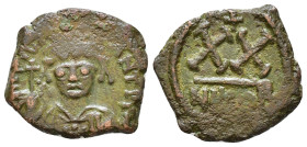 Tiberius II Constantine. 578-582 AD. AE 20 Nummi. Nicomedia. Helmeted, draped and cuirassed bust facing. / Large XX; above, cross; n ex., NIKO. AE 4,9...