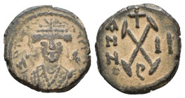 Maurice Tiberius. Æ 10 Nummi. Theoupolis (Antioch) mint, dated RY 2 = 583/4 AD. M TIOI NIATIPP, crowned facing bust, with trefoil ornament, wearing co...