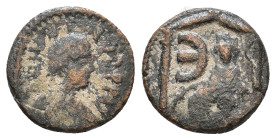 Justin I. 518-527 AD. Æ Pentanummium of Antioch. Laureate draped bust / Tyche seated, E, all within shrine. AE 1,48g.