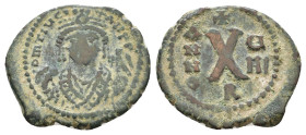 Maurice Tiberius. Æ 10 Nummi. Theoupolis (Antioch), dated RY 8 = 589/90 AD. D m TIb COTANT P P I, crowned bust facing, wearing consular robes, holding...